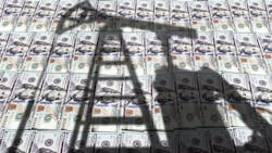 Pump jack on US US dollar notes,